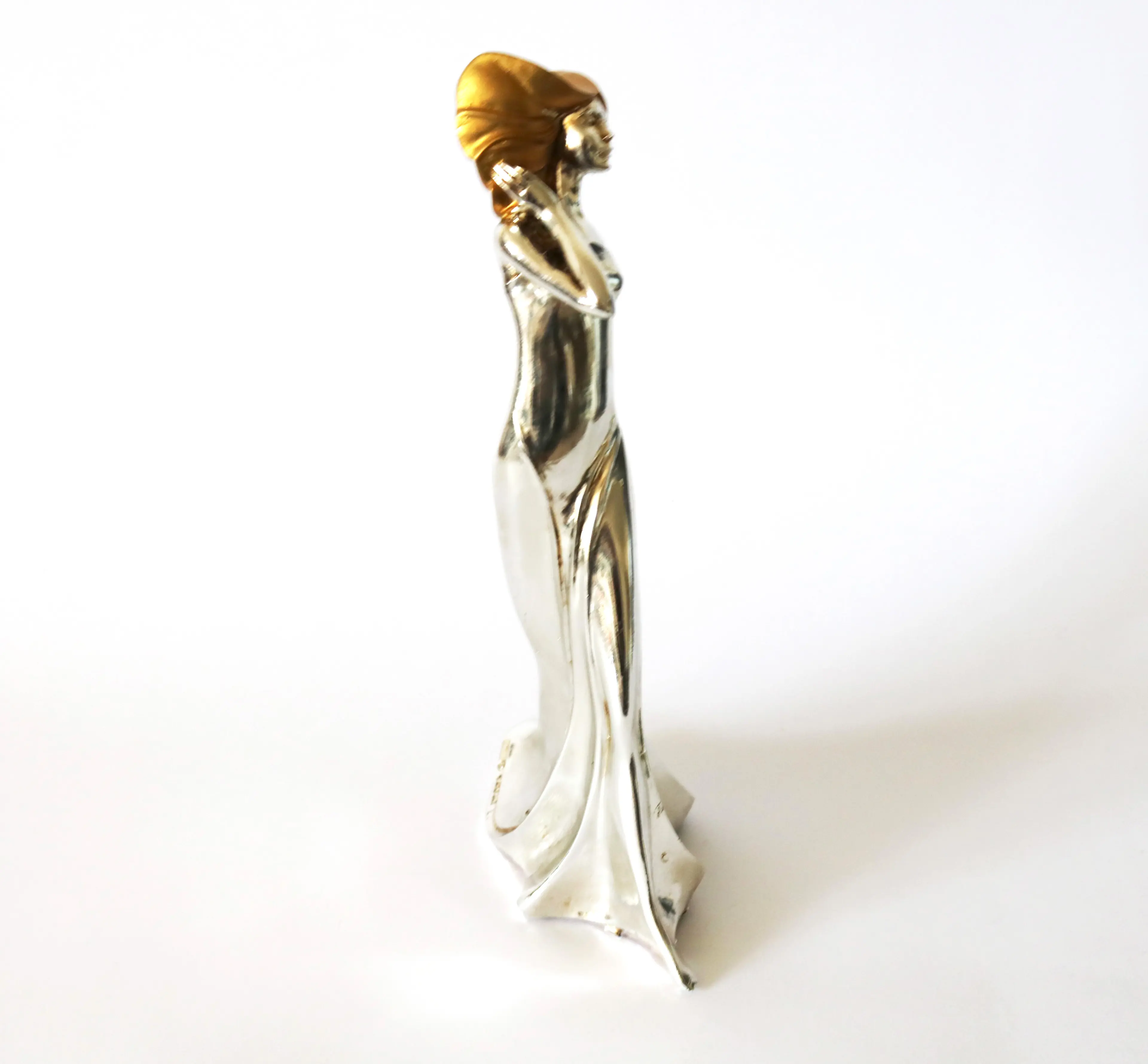 Gold And Silver Figurine Women