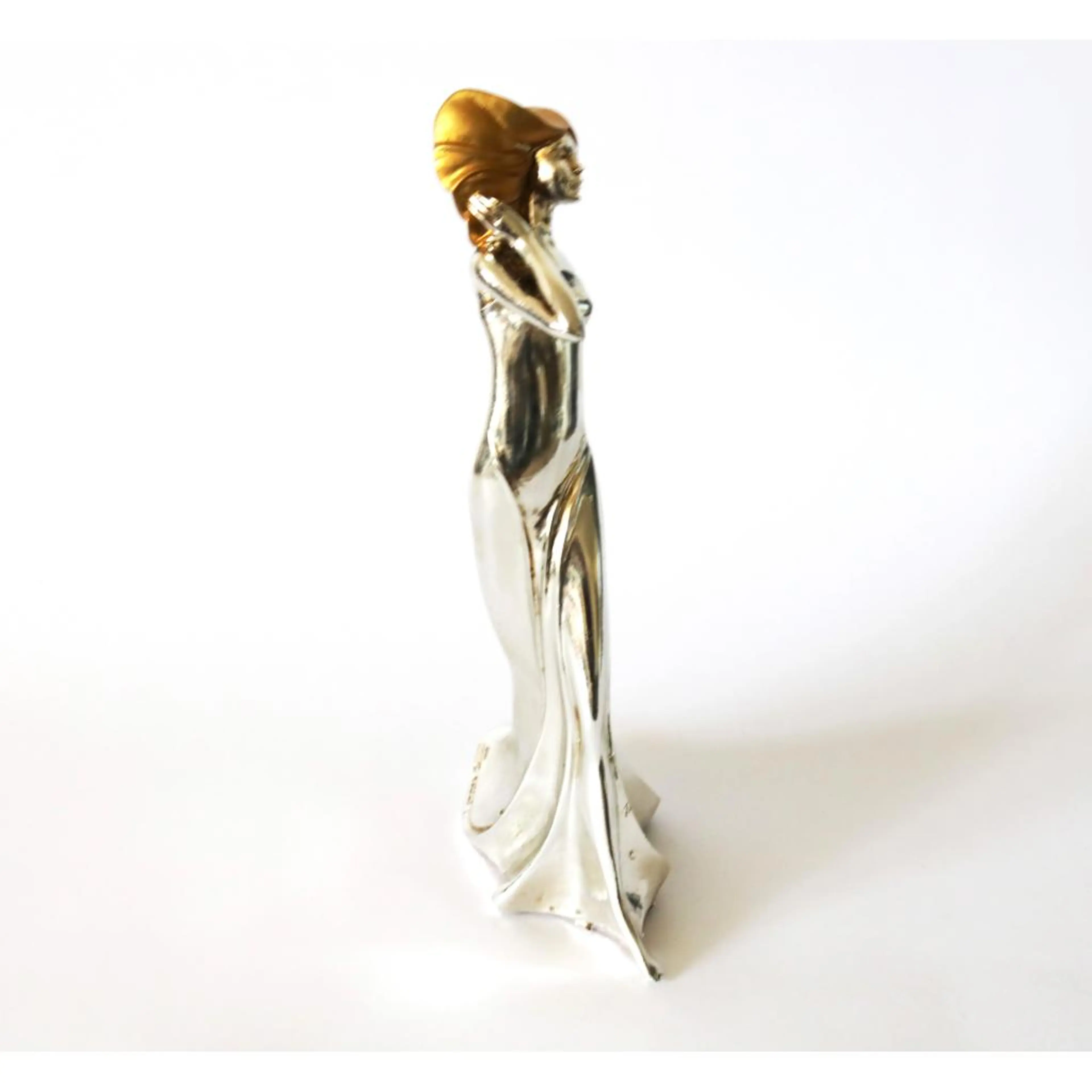 Gold And Silver Figurine Women
